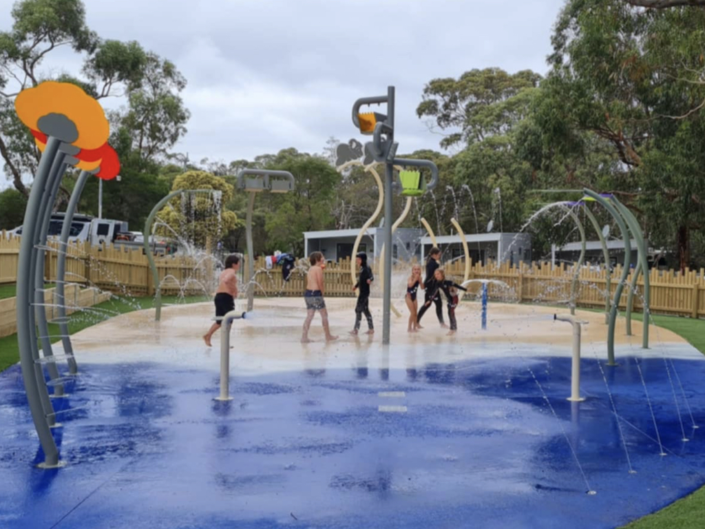 Parents and children at Bimbi Park water playground